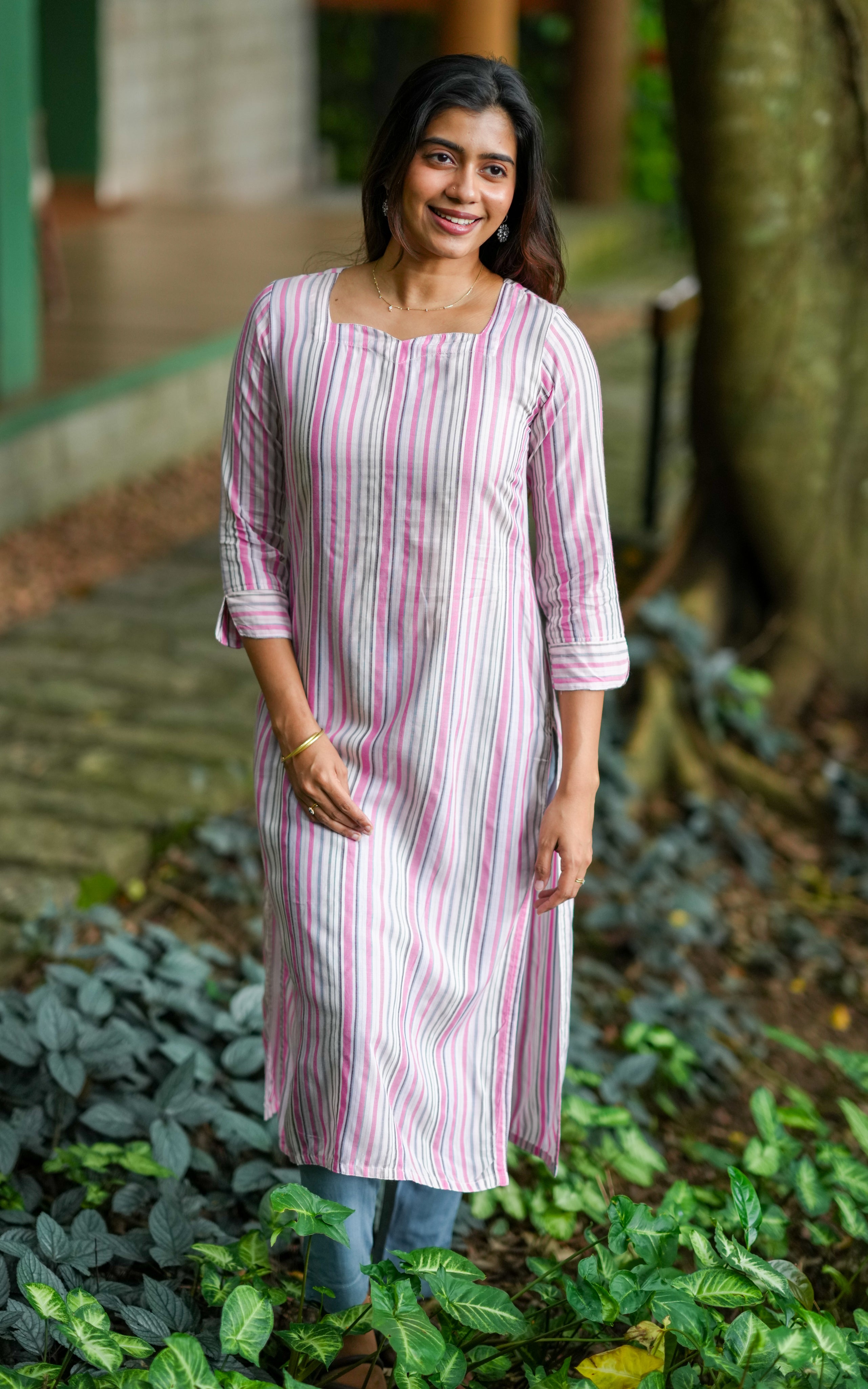  Sleek and professional straight-cut kurti designed for office hours.