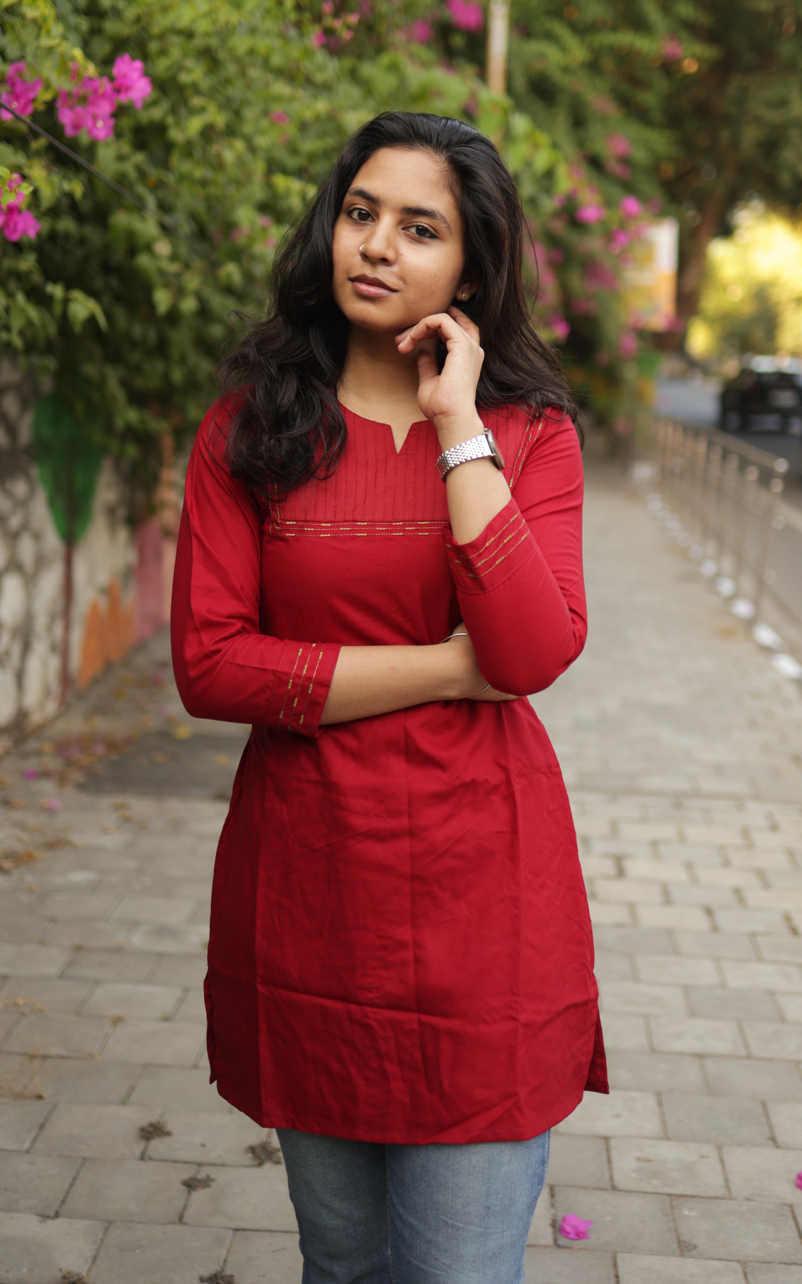 elegant short kurti paired with jeans
